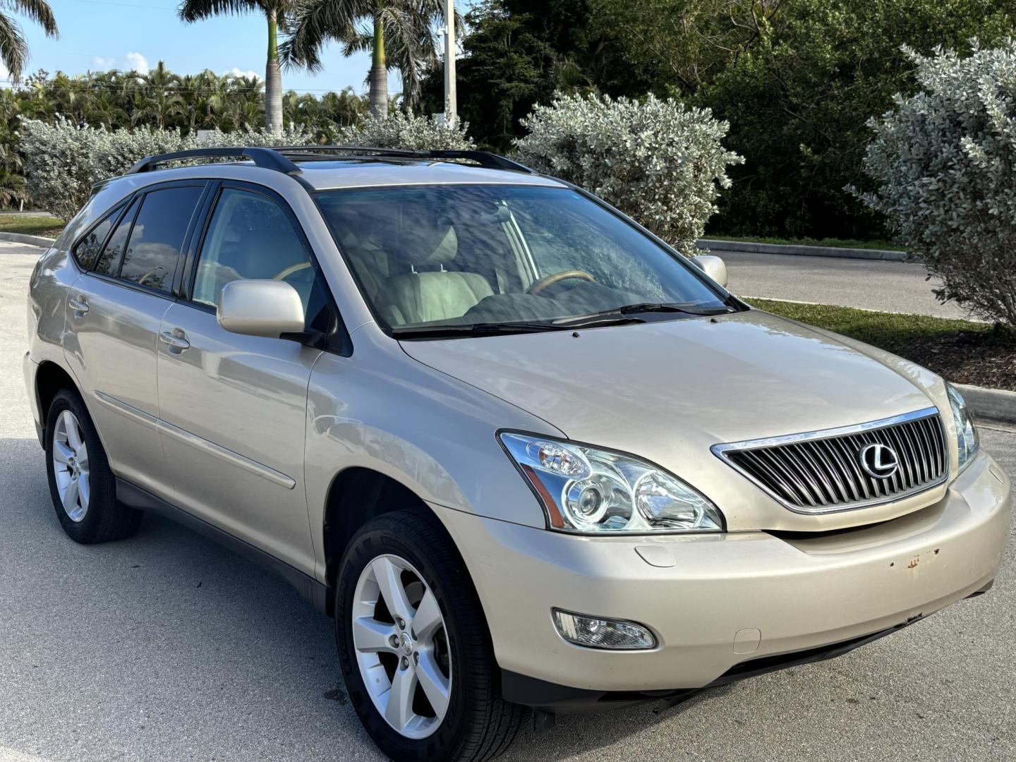 2004 GOLD /TAN LEATHER Lexus RX 330 4WD (JTJHA31U640) with an 3.3L V6 DOHC 24V engine, 5-Speed Automatic Overdrive transmission, located at 11170 Summerlin Square Dr., Fort Myers Beach, FL, 33931, (239) 999-7777, 26.493546, -81.941628 - Photo#2