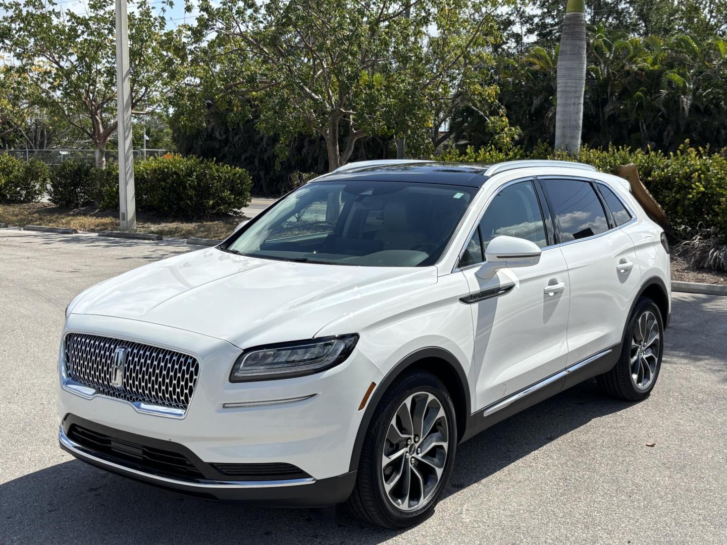 2021 WHITE /TAN Lincoln Nautilus Reserve AWD (2LMPJ8K97MB) with an 2.0L L4 DOHC 16V engine, 6A transmission, located at 11170 Summerlin Square Dr., Fort Myers Beach, FL, 33931, (239) 999-7777, 26.493546, -81.941628 - Photo#0
