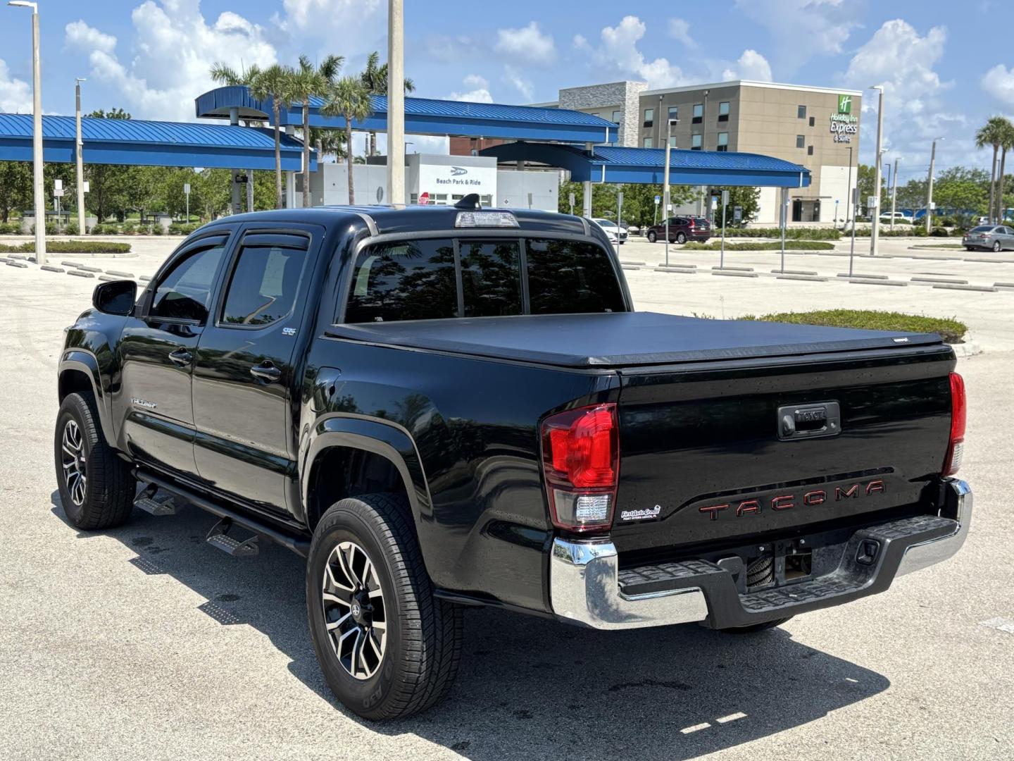 2019 BLACK /charcoal Toyota Tacoma SR5 Double Cab Long Bed I4 6AT 2WD (5TFAX5GN5KX) with an 2.7L L4 DOHC 16V engine, 6A transmission, located at 11170 Summerlin Square Dr., Fort Myers Beach, FL, 33931, (239) 999-7777, 26.493546, -81.941628 - We have financing available and we accept trades! Fill out a credit application on our website or come by today! If you have any questions, give us a call at (239) 999 - 7777 or visit our website at firstautocredit.com. 11170 Summerlin Square Dr, Fort Myers Beach, FL 33931 Carfax 4 Owner V - Photo#4