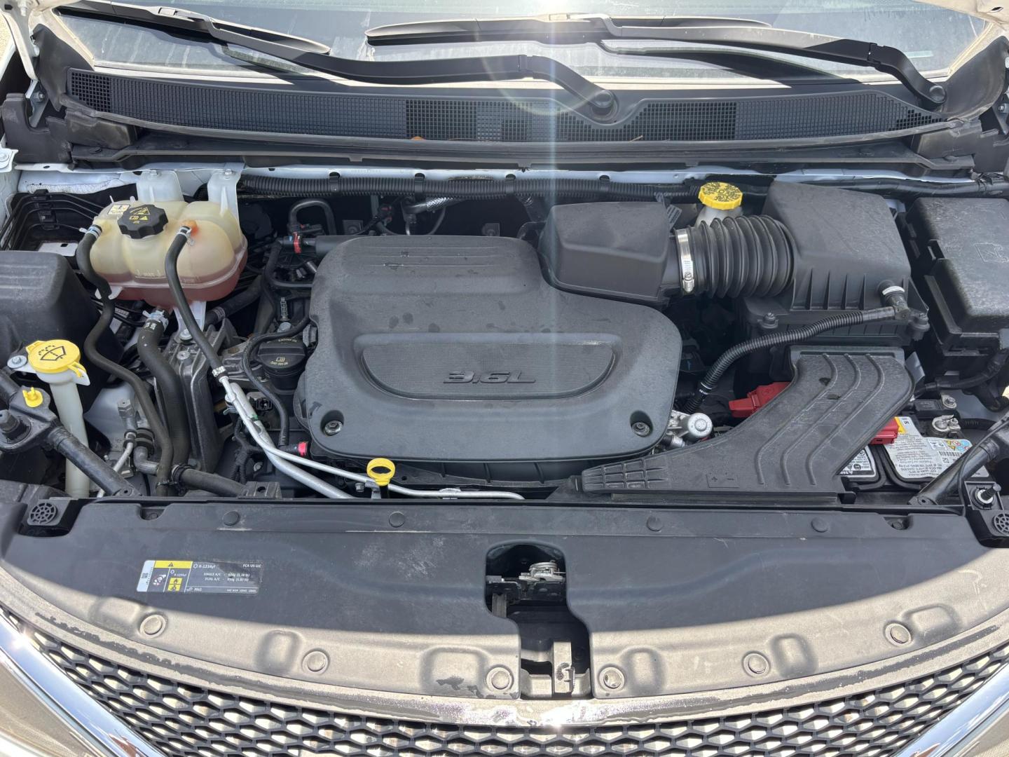 2021 WHITE /GRAY CLOTH Chrysler Voyager LX (2C4RC1CG5MR) with an 3.6L V6 DOHC 24V engine, 9A transmission, located at 11170 Summerlin Square Dr., Fort Myers Beach, FL, 33931, (239) 999-7777, 26.493546, -81.941628 - We have financing available and we accept trades! Fill out a credit application on our website or come by today! If you have any questions, give us a call at (239) 999 - 7777 or visit our website at firstautocredit.com. 11170 Summerlin Square Dr, Fort Myers Beach, FL 33931 Carfax 1 Owner - Photo#42