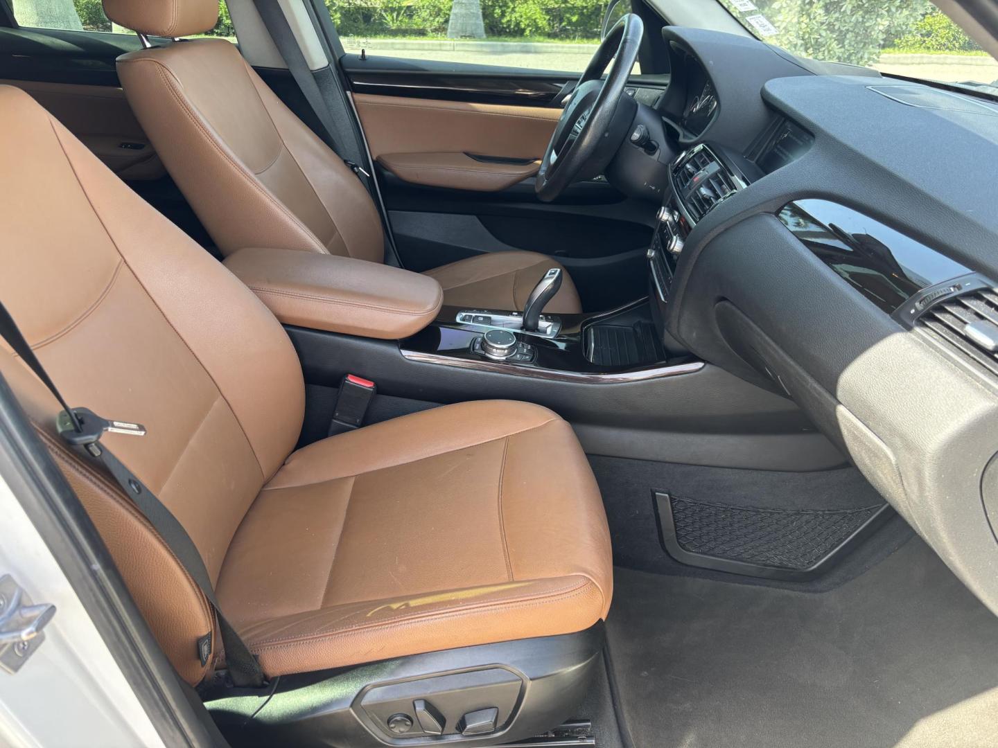 2016 WHITE /BROWN BMW X3 xDrive28i (5UXWX9C5XG0) with an 2.0L L4 DOHC 16V engine, 8-Speed Automatic transmission, located at 11170 Summerlin Square Dr., Fort Myers Beach, FL, 33931, (239) 999-7777, 26.493546, -81.941628 - We have financing available and we accept trades! Fill out a credit application on our website or come by today! If you have any questions, give us a call at (239) 999 - 7777 or visit our website at firstautocredit.com. 11170 Summerlin Square Dr, Fort Myers Beach, FL 33931 2 Owner No Damage - Photo#26