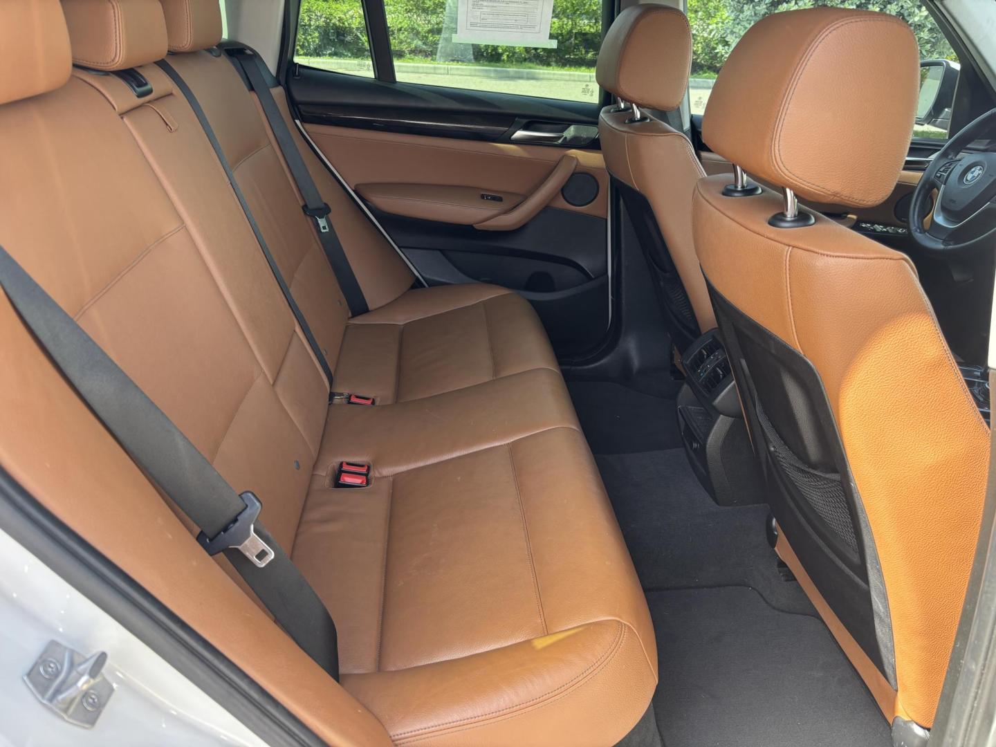 2016 WHITE /BROWN BMW X3 xDrive28i (5UXWX9C5XG0) with an 2.0L L4 DOHC 16V engine, 8-Speed Automatic transmission, located at 11170 Summerlin Square Dr., Fort Myers Beach, FL, 33931, (239) 999-7777, 26.493546, -81.941628 - We have financing available and we accept trades! Fill out a credit application on our website or come by today! If you have any questions, give us a call at (239) 999 - 7777 or visit our website at firstautocredit.com. 11170 Summerlin Square Dr, Fort Myers Beach, FL 33931 2 Owner No Damage - Photo#29