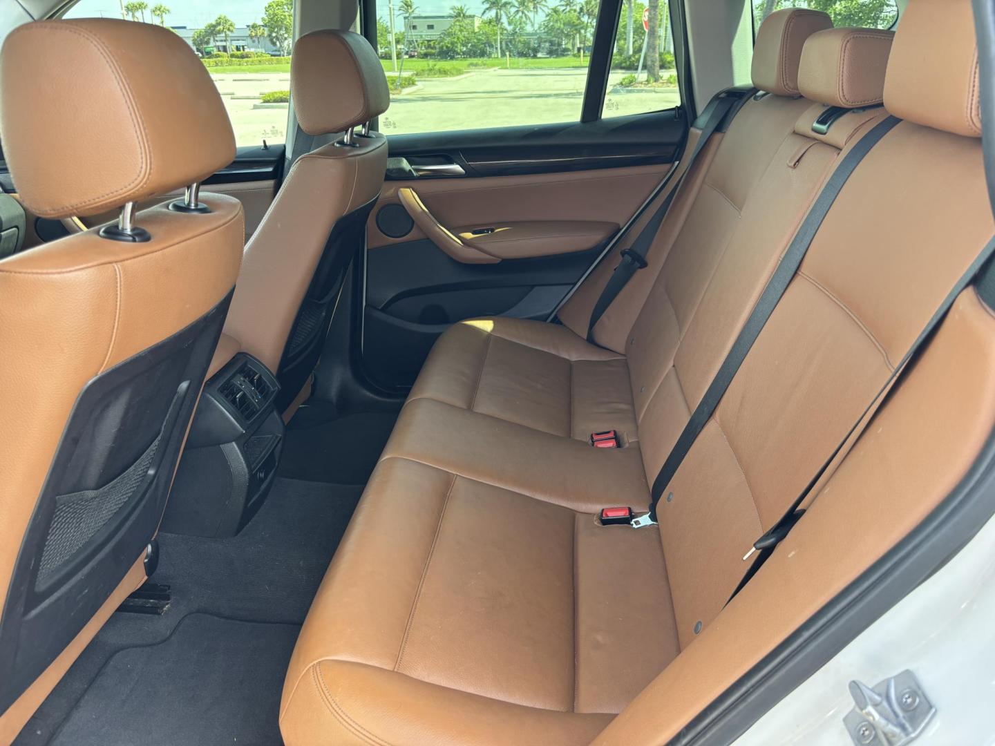 2016 WHITE /BROWN BMW X3 xDrive28i (5UXWX9C5XG0) with an 2.0L L4 DOHC 16V engine, 8-Speed Automatic transmission, located at 11170 Summerlin Square Dr., Fort Myers Beach, FL, 33931, (239) 999-7777, 26.493546, -81.941628 - We have financing available and we accept trades! Fill out a credit application on our website or come by today! If you have any questions, give us a call at (239) 999 - 7777 or visit our website at firstautocredit.com. 11170 Summerlin Square Dr, Fort Myers Beach, FL 33931 2 Owner No Damage - Photo#27