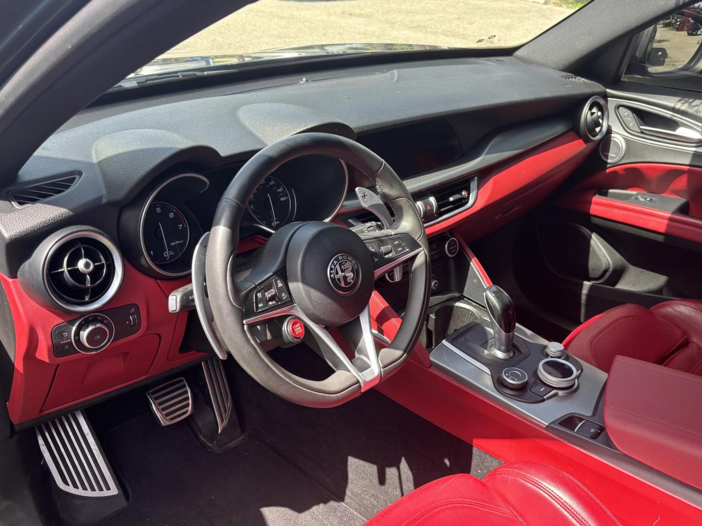 2018 GRAY /red Alfa Romeo Stelvio Ti Sport (ZASFAKNNXJ7) with an 2.0L L4 DOHC 16V engine, 8A transmission, located at 11170 Summerlin Square Dr., Fort Myers Beach, FL, 33931, (239) 999-7777, 26.493546, -81.941628 - We have financing available and we accept trades! Fill out a credit application on our website or come by today! If you have any questions, give us a call at (239) 999 - 7777 or visit our website at firstautocredit.com. 11170 Summerlin Square Dr, Fort Myers Beach, FL 33931 Carfax No Acciden - Photo#9