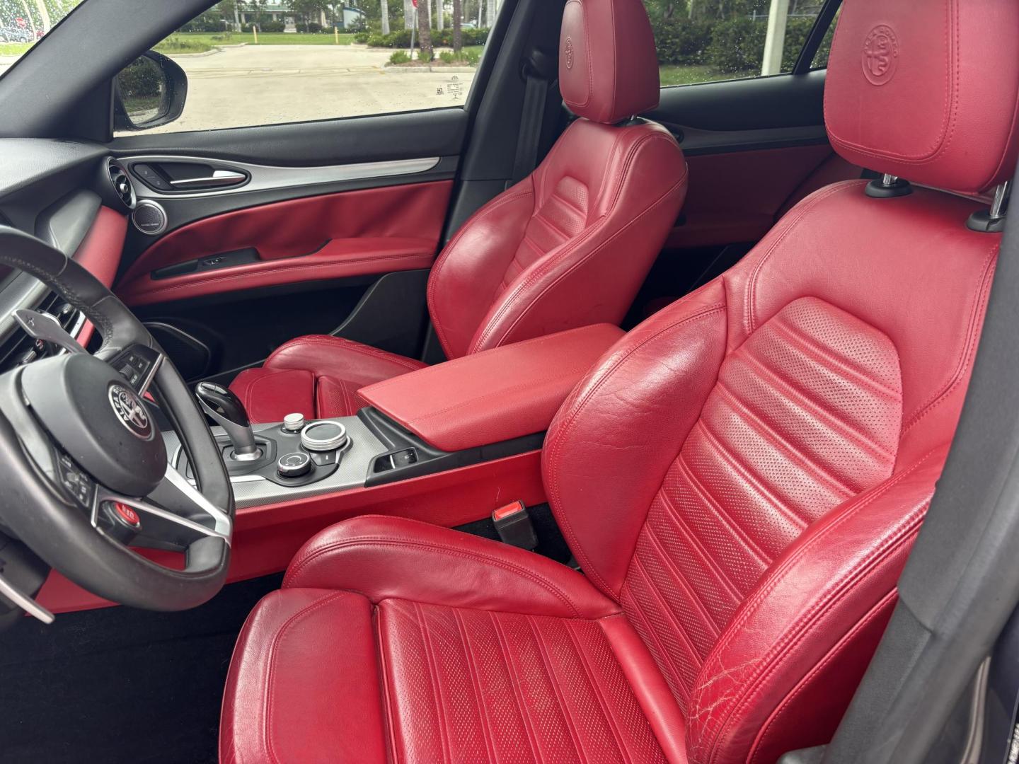 2018 GRAY /red Alfa Romeo Stelvio Ti Sport (ZASFAKNNXJ7) with an 2.0L L4 DOHC 16V engine, 8A transmission, located at 11170 Summerlin Square Dr., Fort Myers Beach, FL, 33931, (239) 999-7777, 26.493546, -81.941628 - We have financing available and we accept trades! Fill out a credit application on our website or come by today! If you have any questions, give us a call at (239) 999 - 7777 or visit our website at firstautocredit.com. 11170 Summerlin Square Dr, Fort Myers Beach, FL 33931 Carfax No Acciden - Photo#8