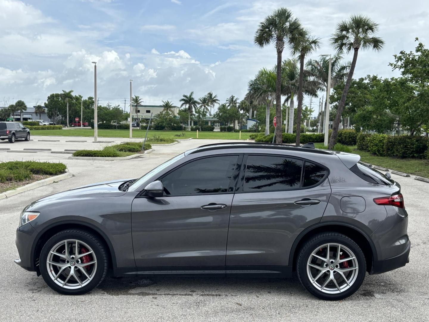 2018 GRAY /red Alfa Romeo Stelvio Ti Sport (ZASFAKNNXJ7) with an 2.0L L4 DOHC 16V engine, 8A transmission, located at 11170 Summerlin Square Dr., Fort Myers Beach, FL, 33931, (239) 999-7777, 26.493546, -81.941628 - We have financing available and we accept trades! Fill out a credit application on our website or come by today! If you have any questions, give us a call at (239) 999 - 7777 or visit our website at firstautocredit.com. 11170 Summerlin Square Dr, Fort Myers Beach, FL 33931 Carfax No Acciden - Photo#7
