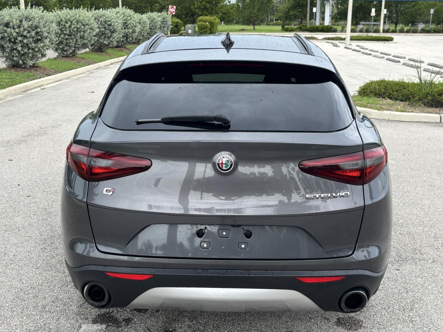 2018 GRAY /red Alfa Romeo Stelvio Ti Sport (ZASFAKNNXJ7) with an 2.0L L4 DOHC 16V engine, 8A transmission, located at 11170 Summerlin Square Dr., Fort Myers Beach, FL, 33931, (239) 999-7777, 26.493546, -81.941628 - We have financing available and we accept trades! Fill out a credit application on our website or come by today! If you have any questions, give us a call at (239) 999 - 7777 or visit our website at firstautocredit.com. 11170 Summerlin Square Dr, Fort Myers Beach, FL 33931 Carfax No Acciden - Photo#5