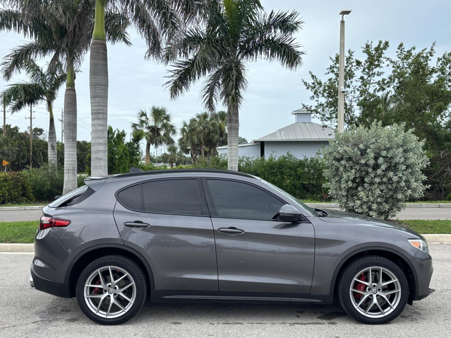 2018 GRAY /red Alfa Romeo Stelvio Ti Sport (ZASFAKNNXJ7) with an 2.0L L4 DOHC 16V engine, 8A transmission, located at 11170 Summerlin Square Dr., Fort Myers Beach, FL, 33931, (239) 999-7777, 26.493546, -81.941628 - We have financing available and we accept trades! Fill out a credit application on our website or come by today! If you have any questions, give us a call at (239) 999 - 7777 or visit our website at firstautocredit.com. 11170 Summerlin Square Dr, Fort Myers Beach, FL 33931 Carfax No Acciden - Photo#3