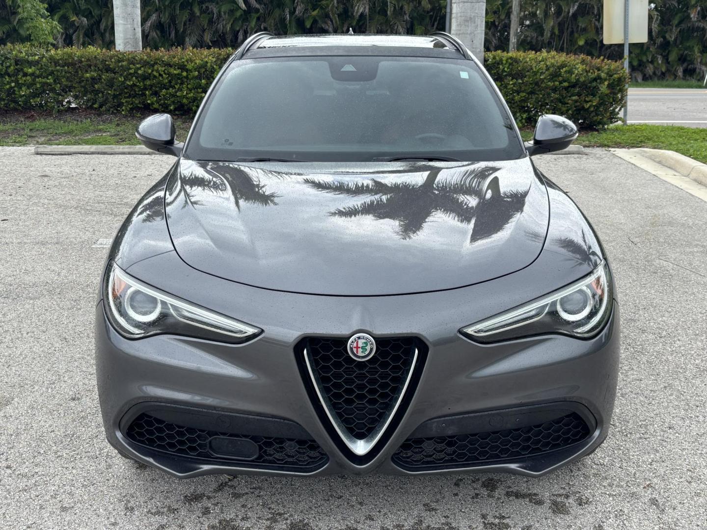 2018 GRAY /red Alfa Romeo Stelvio Ti Sport (ZASFAKNNXJ7) with an 2.0L L4 DOHC 16V engine, 8A transmission, located at 11170 Summerlin Square Dr., Fort Myers Beach, FL, 33931, (239) 999-7777, 26.493546, -81.941628 - We have financing available and we accept trades! Fill out a credit application on our website or come by today! If you have any questions, give us a call at (239) 999 - 7777 or visit our website at firstautocredit.com. 11170 Summerlin Square Dr, Fort Myers Beach, FL 33931 Carfax No Acciden - Photo#1