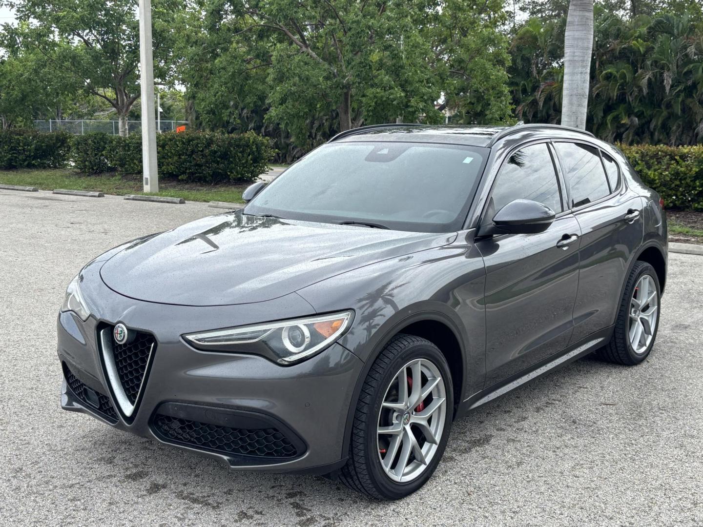 2018 GRAY /red Alfa Romeo Stelvio Ti Sport (ZASFAKNNXJ7) with an 2.0L L4 DOHC 16V engine, 8A transmission, located at 11170 Summerlin Square Dr., Fort Myers Beach, FL, 33931, (239) 999-7777, 26.493546, -81.941628 - We have financing available and we accept trades! Fill out a credit application on our website or come by today! If you have any questions, give us a call at (239) 999 - 7777 or visit our website at firstautocredit.com. 11170 Summerlin Square Dr, Fort Myers Beach, FL 33931 Carfax No Acciden - Photo#0