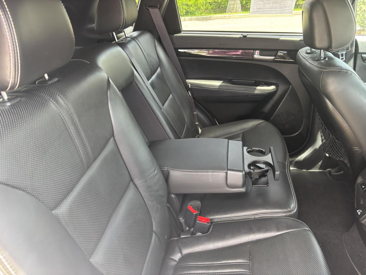 2014 WHITE /BLACK Kia Sorento SX V6 FWD (5XYKW4A72EG) with an 3.3L V6 DOHC 24V engine, 6-Speed Automatic transmission, located at 11170 Summerlin Square Dr., Fort Myers Beach, FL, 33931, (239) 999-7777, 26.493546, -81.941628 - We have financing available and we accept trades! Fill out a credit application on our website or come by today! If you have any questions, give us a call at (239) 999 - 7777 or visit our website at firstautocredit.com. 11170 Summerlin Square Dr, Fort Myers Beach, FL 33931 - Photo#24