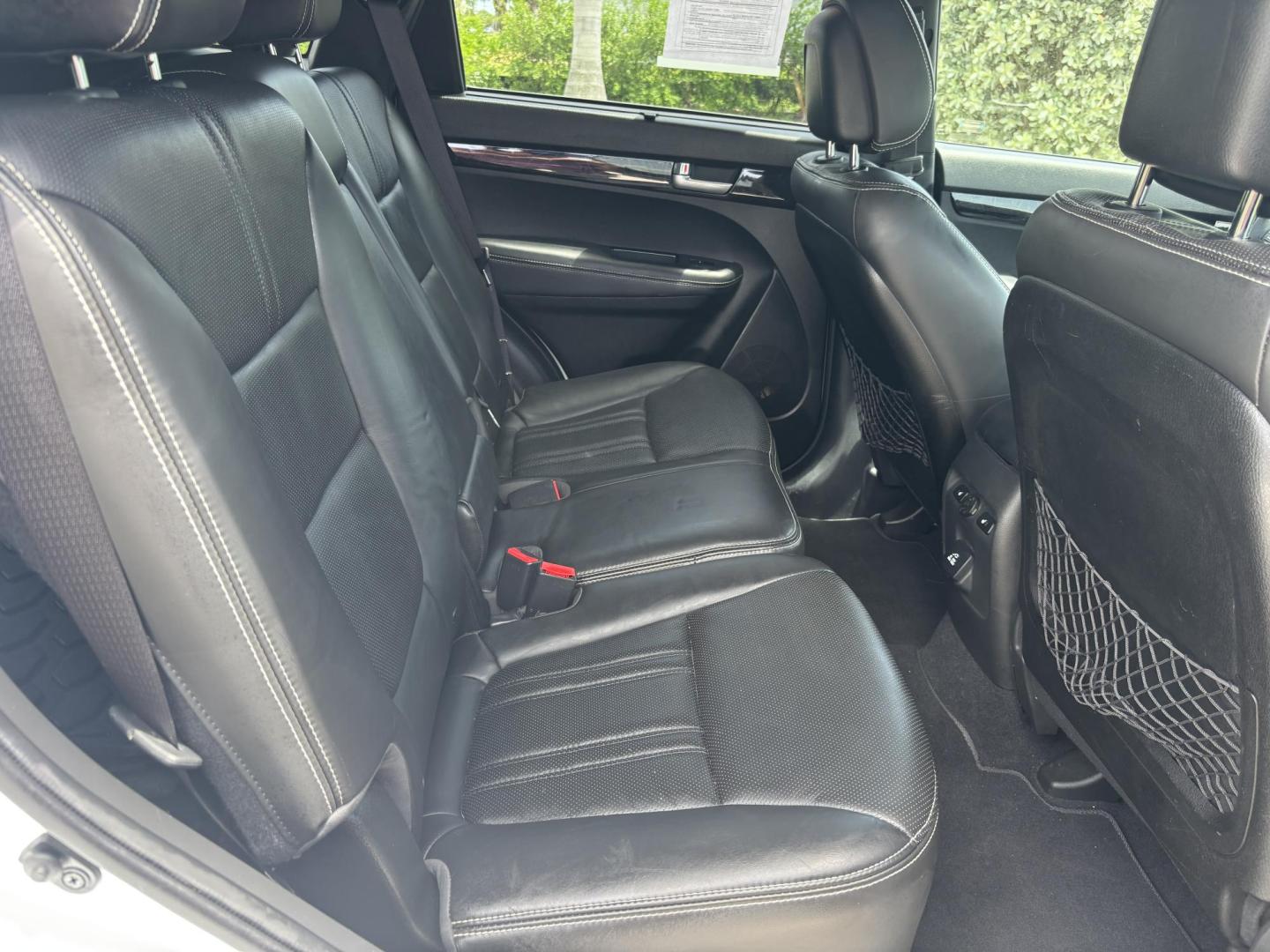 2014 WHITE /BLACK Kia Sorento SX V6 FWD (5XYKW4A72EG) with an 3.3L V6 DOHC 24V engine, 6-Speed Automatic transmission, located at 11170 Summerlin Square Dr., Fort Myers Beach, FL, 33931, (239) 999-7777, 26.493546, -81.941628 - We have financing available and we accept trades! Fill out a credit application on our website or come by today! If you have any questions, give us a call at (239) 999 - 7777 or visit our website at firstautocredit.com. 11170 Summerlin Square Dr, Fort Myers Beach, FL 33931 - Photo#27