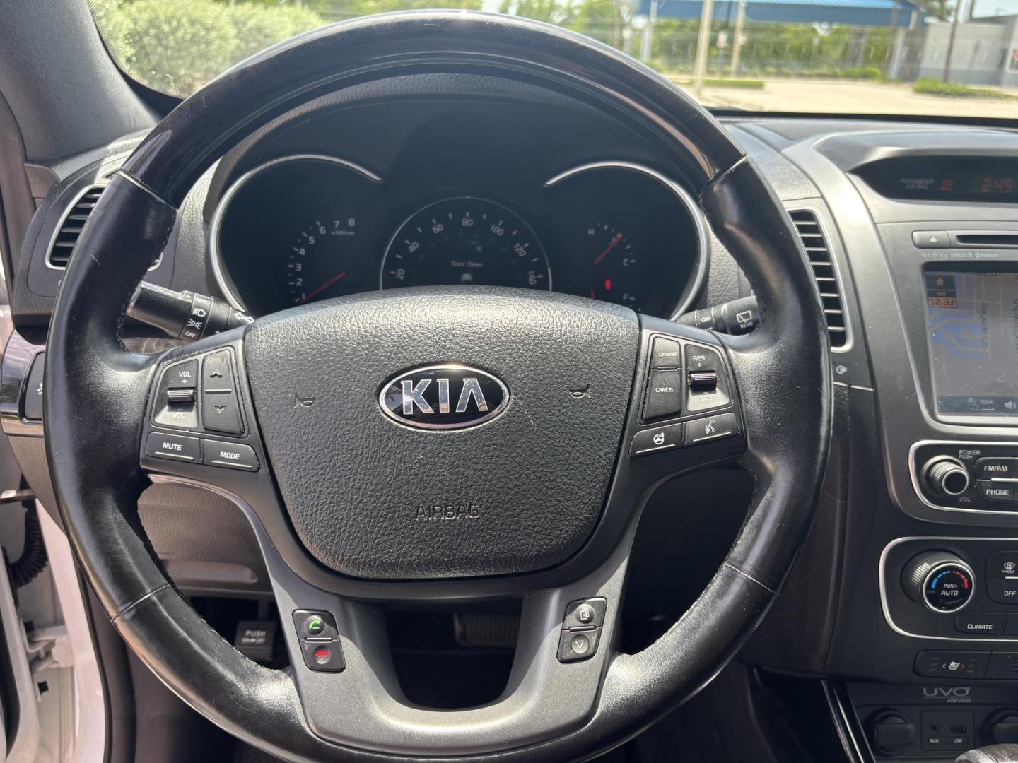 2014 WHITE /BLACK Kia Sorento SX V6 FWD (5XYKW4A72EG) with an 3.3L V6 DOHC 24V engine, 6-Speed Automatic transmission, located at 11170 Summerlin Square Dr., Fort Myers Beach, FL, 33931, (239) 999-7777, 26.493546, -81.941628 - We have financing available and we accept trades! Fill out a credit application on our website or come by today! If you have any questions, give us a call at (239) 999 - 7777 or visit our website at firstautocredit.com. 11170 Summerlin Square Dr, Fort Myers Beach, FL 33931 - Photo#28