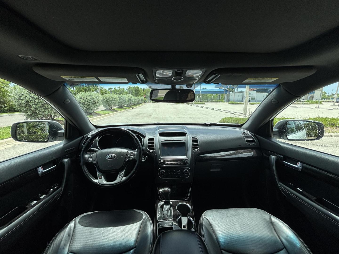 2014 WHITE /BLACK Kia Sorento SX V6 FWD (5XYKW4A72EG) with an 3.3L V6 DOHC 24V engine, 6-Speed Automatic transmission, located at 11170 Summerlin Square Dr., Fort Myers Beach, FL, 33931, (239) 999-7777, 26.493546, -81.941628 - We have financing available and we accept trades! Fill out a credit application on our website or come by today! If you have any questions, give us a call at (239) 999 - 7777 or visit our website at firstautocredit.com. 11170 Summerlin Square Dr, Fort Myers Beach, FL 33931 - Photo#8