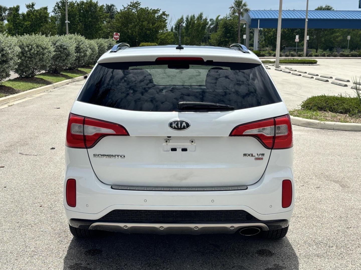 2014 WHITE /BLACK Kia Sorento SX V6 FWD (5XYKW4A72EG) with an 3.3L V6 DOHC 24V engine, 6-Speed Automatic transmission, located at 11170 Summerlin Square Dr., Fort Myers Beach, FL, 33931, (239) 999-7777, 26.493546, -81.941628 - We have financing available and we accept trades! Fill out a credit application on our website or come by today! If you have any questions, give us a call at (239) 999 - 7777 or visit our website at firstautocredit.com. 11170 Summerlin Square Dr, Fort Myers Beach, FL 33931 - Photo#5