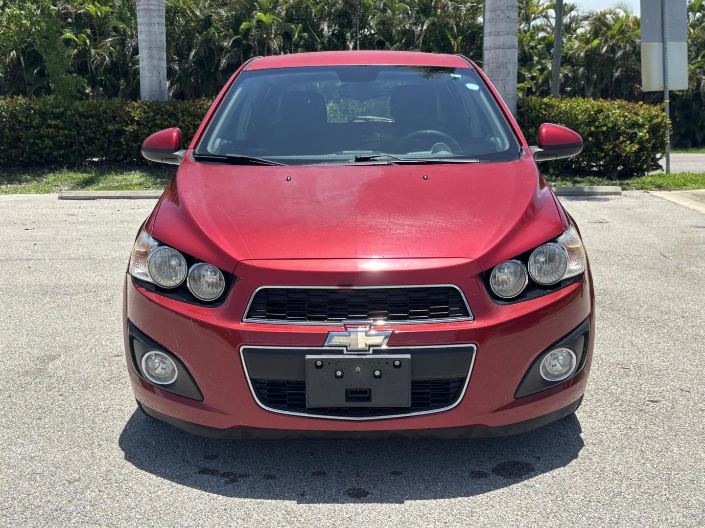 2013 RED /DARK GRAY Chevrolet Sonic LT Auto 5-Door (1G1JC6SH1D4) with an 1.8L L4 DOHC 24V FFV engine, 6-Speed Automatic transmission, located at 11170 Summerlin Square Dr., Fort Myers Beach, FL, 33931, (239) 999-7777, 26.493546, -81.941628 - We have financing available and we accept trades! Fill out a credit application on our website or come by today! If you have any questions, give us a call at (239) 999 - 7777 or visit our website at firstautocredit.com. 11170 Summerlin Square Dr, Fort Myers Beach, FL 33931 Carfax 2 Owner M - Photo#1
