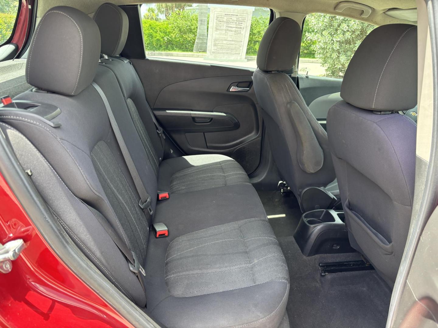 2013 RED /DARK GRAY Chevrolet Sonic LT Auto 5-Door (1G1JC6SH1D4) with an 1.8L L4 DOHC 24V FFV engine, 6-Speed Automatic transmission, located at 11170 Summerlin Square Dr., Fort Myers Beach, FL, 33931, (239) 999-7777, 26.493546, -81.941628 - We have financing available and we accept trades! Fill out a credit application on our website or come by today! If you have any questions, give us a call at (239) 999 - 7777 or visit our website at firstautocredit.com. 11170 Summerlin Square Dr, Fort Myers Beach, FL 33931 Carfax 2 Owner M - Photo#11