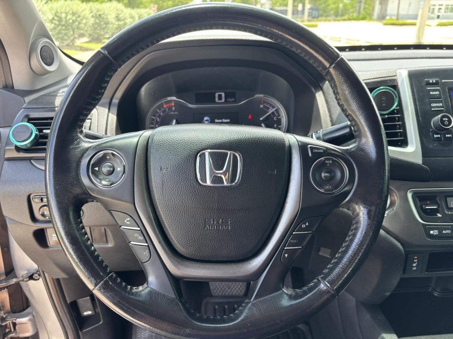 2018 GRAY /BLACK Honda Ridgeline RTL (5FPYK2F58JB) with an 3.5L V6 SOHC 24V engine, 6A transmission, located at 11170 Summerlin Square Dr., Fort Myers Beach, FL, 33931, (239) 999-7777, 26.493546, -81.941628 - We have financing available and we accept trades! Fill out a credit application on our website or come by today! If you have any questions, give us a call at (239) 999 - 7777 or visit our website at firstautocredit.com. 11170 Summerlin Square Dr, Fort Myers Beach, FL 33931 - Photo#26