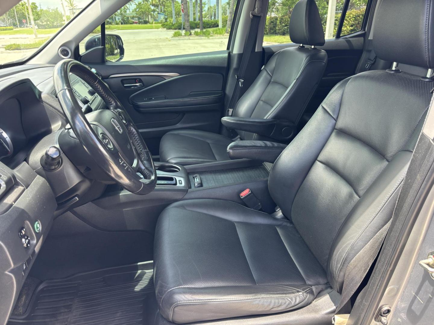 2018 GRAY /BLACK Honda Ridgeline RTL (5FPYK2F58JB) with an 3.5L V6 SOHC 24V engine, 6A transmission, located at 11170 Summerlin Square Dr., Fort Myers Beach, FL, 33931, (239) 999-7777, 26.493546, -81.941628 - We have financing available and we accept trades! Fill out a credit application on our website or come by today! If you have any questions, give us a call at (239) 999 - 7777 or visit our website at firstautocredit.com. 11170 Summerlin Square Dr, Fort Myers Beach, FL 33931 - Photo#15