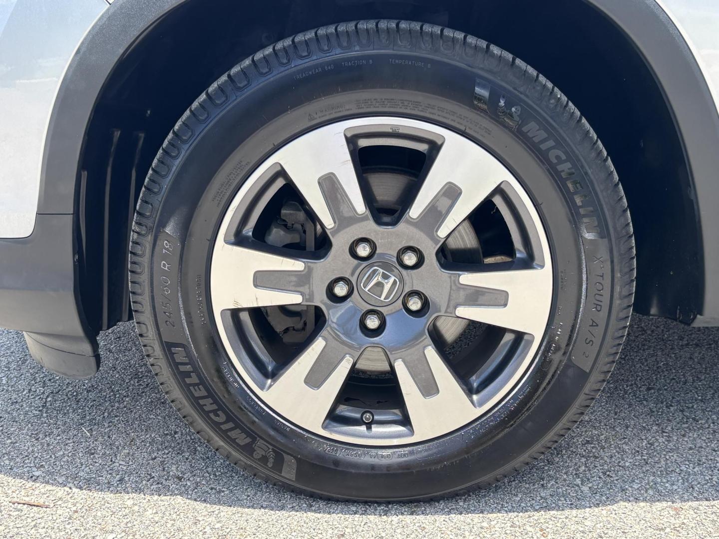 2018 GRAY /BLACK Honda Ridgeline RTL (5FPYK2F58JB) with an 3.5L V6 SOHC 24V engine, 6A transmission, located at 11170 Summerlin Square Dr., Fort Myers Beach, FL, 33931, (239) 999-7777, 26.493546, -81.941628 - We have financing available and we accept trades! Fill out a credit application on our website or come by today! If you have any questions, give us a call at (239) 999 - 7777 or visit our website at firstautocredit.com. 11170 Summerlin Square Dr, Fort Myers Beach, FL 33931 - Photo#42