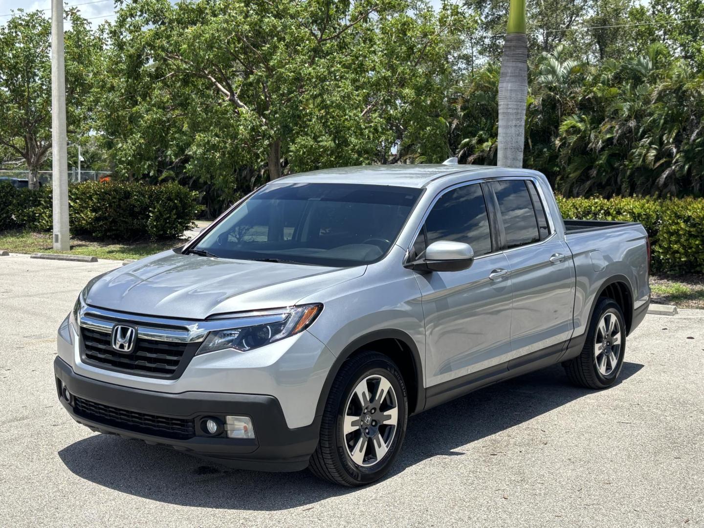 2018 GRAY /BLACK Honda Ridgeline RTL (5FPYK2F58JB) with an 3.5L V6 SOHC 24V engine, 6A transmission, located at 11170 Summerlin Square Dr., Fort Myers Beach, FL, 33931, (239) 999-7777, 26.493546, -81.941628 - We have financing available and we accept trades! Fill out a credit application on our website or come by today! If you have any questions, give us a call at (239) 999 - 7777 or visit our website at firstautocredit.com. 11170 Summerlin Square Dr, Fort Myers Beach, FL 33931 - Photo#0