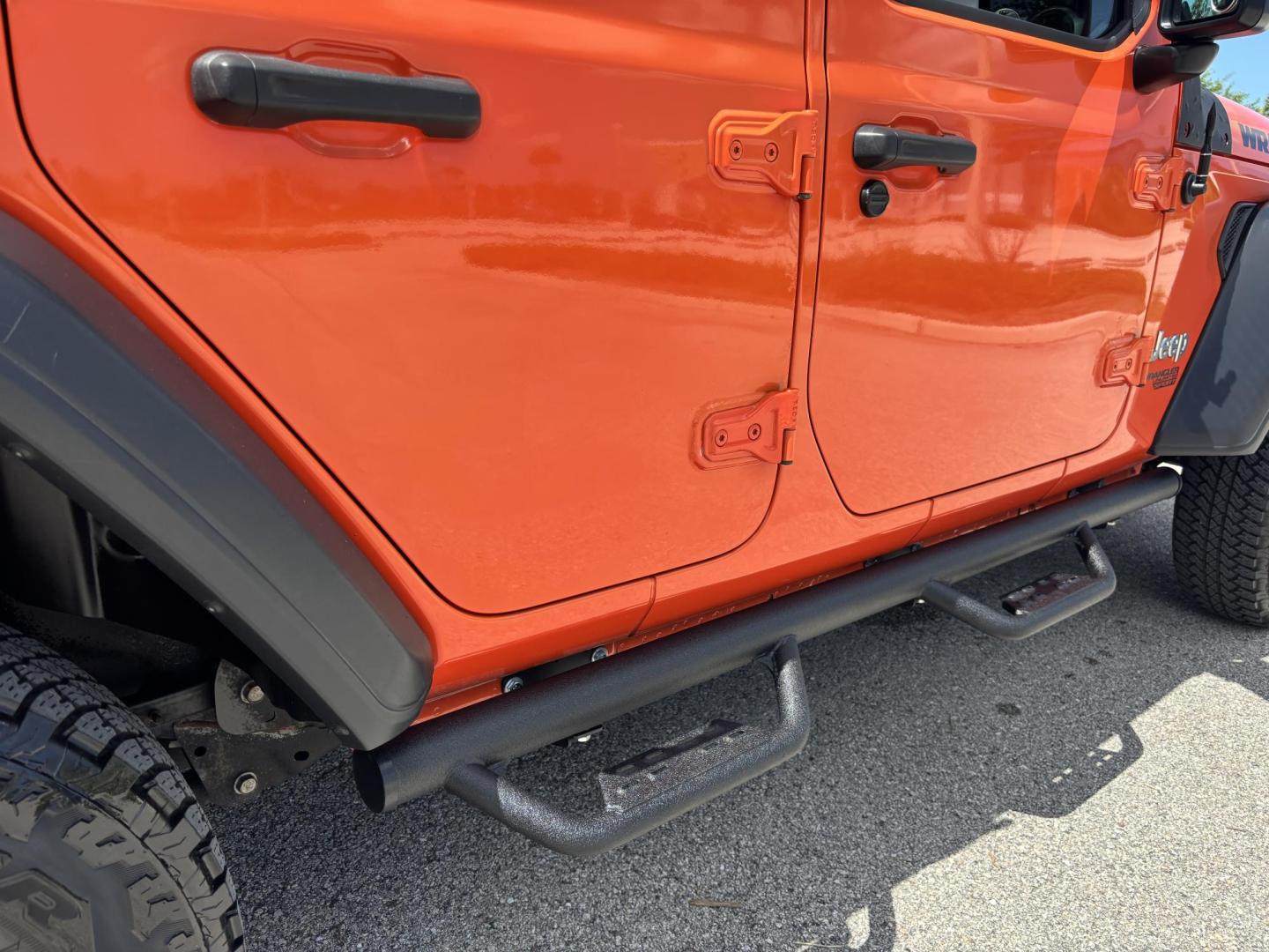 2018 ORANGE /charcoal Jeep Wrangler Unlimited Sport (1C4HJXDN1JW) with an 2.0L L4 DOHC 16V TURBO engine, 6A transmission, located at 11170 Summerlin Square Dr., Fort Myers Beach, FL, 33931, (239) 999-7777, 26.493546, -81.941628 - We have financing available and we accept trades! Fill out a credit application on our website or come by today! If you have any questions, give us a call at (239) 999 - 7777 or visit our website at firstautocredit.com. 11170 Summerlin Square Dr, Fort Myers Beach, FL 33931 No Damage No Acci - Photo#56
