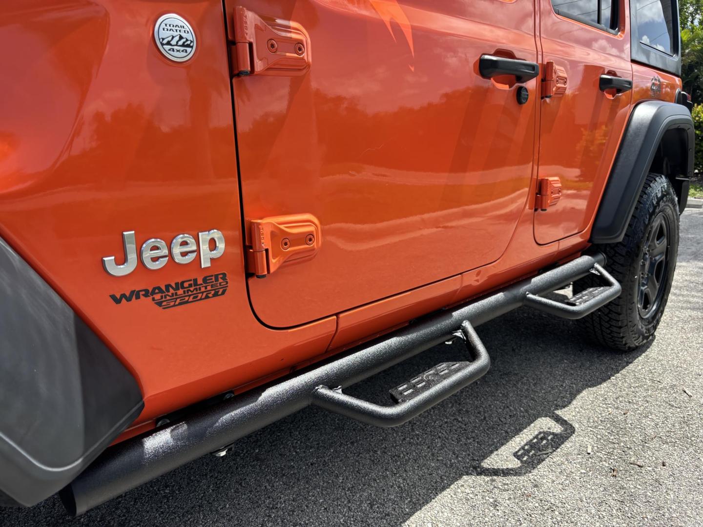 2018 ORANGE /charcoal Jeep Wrangler Unlimited Sport (1C4HJXDN1JW) with an 2.0L L4 DOHC 16V TURBO engine, 6A transmission, located at 11170 Summerlin Square Dr., Fort Myers Beach, FL, 33931, (239) 999-7777, 26.493546, -81.941628 - We have financing available and we accept trades! Fill out a credit application on our website or come by today! If you have any questions, give us a call at (239) 999 - 7777 or visit our website at firstautocredit.com. 11170 Summerlin Square Dr, Fort Myers Beach, FL 33931 No Damage No Acci - Photo#55