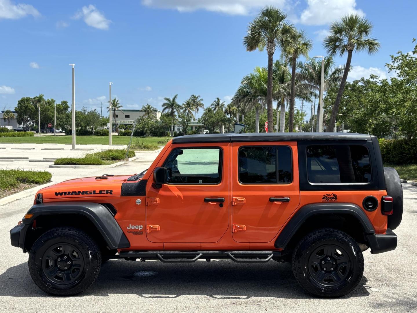 2018 ORANGE /charcoal Jeep Wrangler Unlimited Sport (1C4HJXDN1JW) with an 2.0L L4 DOHC 16V TURBO engine, 6A transmission, located at 11170 Summerlin Square Dr., Fort Myers Beach, FL, 33931, (239) 999-7777, 26.493546, -81.941628 - We have financing available and we accept trades! Fill out a credit application on our website or come by today! If you have any questions, give us a call at (239) 999 - 7777 or visit our website at firstautocredit.com. 11170 Summerlin Square Dr, Fort Myers Beach, FL 33931 No Damage No Acci - Photo#7