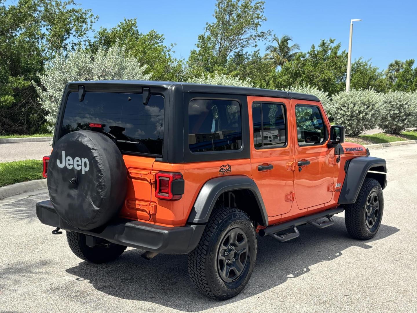 2018 ORANGE /charcoal Jeep Wrangler Unlimited Sport (1C4HJXDN1JW) with an 2.0L L4 DOHC 16V TURBO engine, 6A transmission, located at 11170 Summerlin Square Dr., Fort Myers Beach, FL, 33931, (239) 999-7777, 26.493546, -81.941628 - We have financing available and we accept trades! Fill out a credit application on our website or come by today! If you have any questions, give us a call at (239) 999 - 7777 or visit our website at firstautocredit.com. 11170 Summerlin Square Dr, Fort Myers Beach, FL 33931 No Damage No Acci - Photo#6