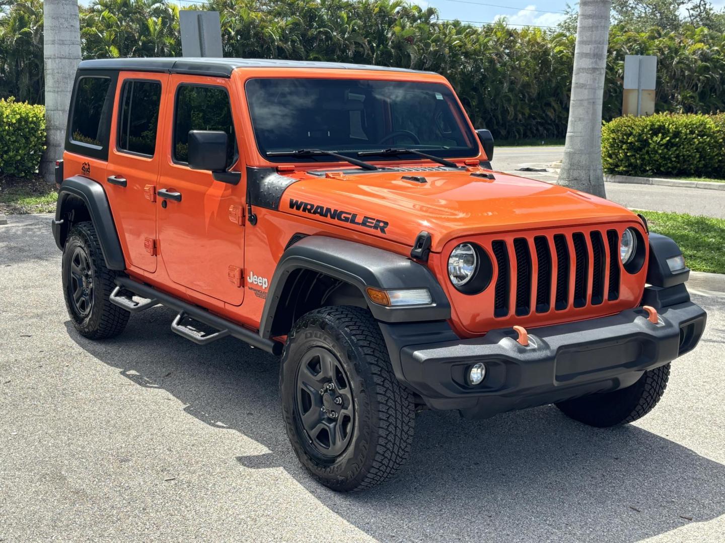 2018 ORANGE /charcoal Jeep Wrangler Unlimited Sport (1C4HJXDN1JW) with an 2.0L L4 DOHC 16V TURBO engine, 6A transmission, located at 11170 Summerlin Square Dr., Fort Myers Beach, FL, 33931, (239) 999-7777, 26.493546, -81.941628 - We have financing available and we accept trades! Fill out a credit application on our website or come by today! If you have any questions, give us a call at (239) 999 - 7777 or visit our website at firstautocredit.com. 11170 Summerlin Square Dr, Fort Myers Beach, FL 33931 No Damage No Acci - Photo#2