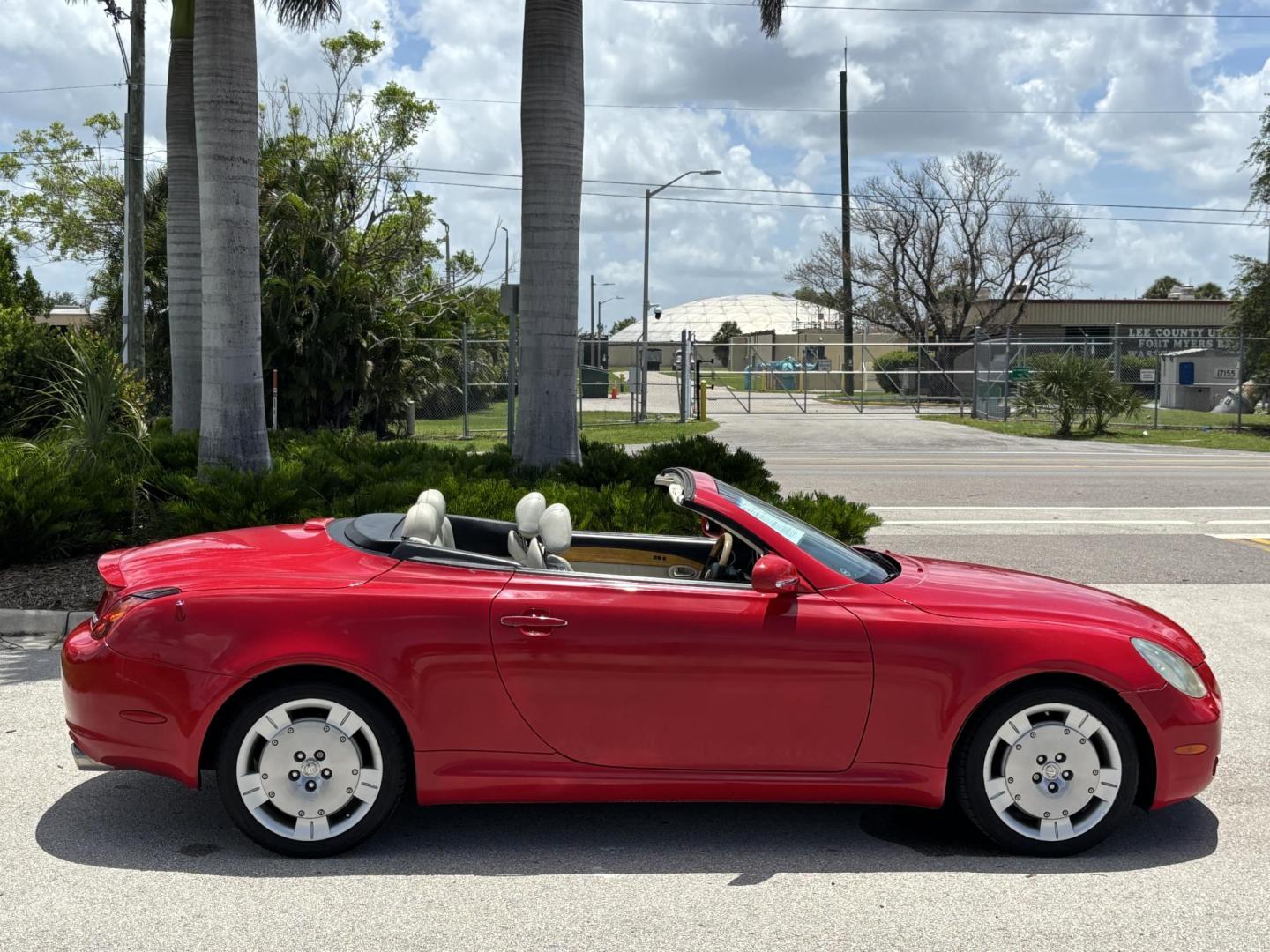 2002 RED /BEIGE Lexus SC 430 Convertible Hardtop Convertible (JTHFN48Y120) with an 4.3L V8 DOHC 32V engine, 5-Speed Automatic Overdrive transmission, located at 11170 Summerlin Square Dr., Fort Myers Beach, FL, 33931, (239) 999-7777, 26.493546, -81.941628 - 4 New Tires We have financing available and we accept trades! Fill out a credit application on our website or come by today! If you have any questions, give us a call at (239) 999 - 7777 or visit our website at firstautocredit.com. 11170 Summerlin Square Dr, Fort Myers Beach, FL 33931 Ca - Photo#3
