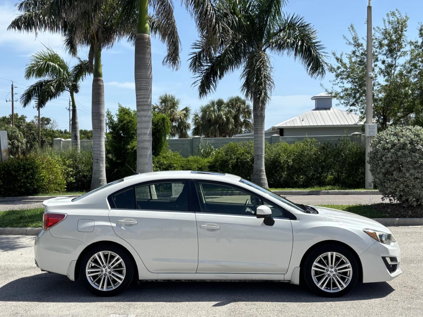 2015 WHITE Subaru Impreza 2.0i Premium PZEV 4-Door (JF1GJAK61FH) with an 2.0L H4 DOHC 16V engine, Continuously Variable Transmission transmission, located at 11170 Summerlin Square Dr., Fort Myers Beach, FL, 33931, (239) 999-7777, 26.493546, -81.941628 - Photo#3