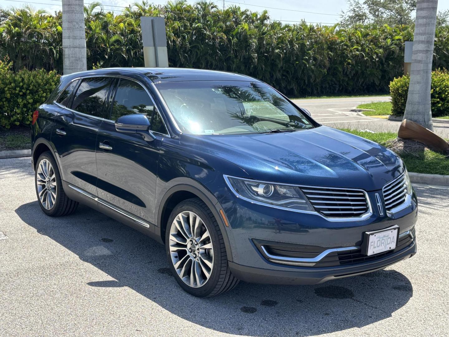 2017 BLUE Lincoln MKX Reserve AWD (2LMPJ8LP2HB) with an 2.7L V6 DOHC 24V engine, 6A transmission, located at 11170 Summerlin Square Dr., Fort Myers Beach, FL, 33931, (239) 999-7777, 26.493546, -81.941628 - Carfax 2 Owner Sale Price $12,900 Carfax Value $14,810 - Photo#2