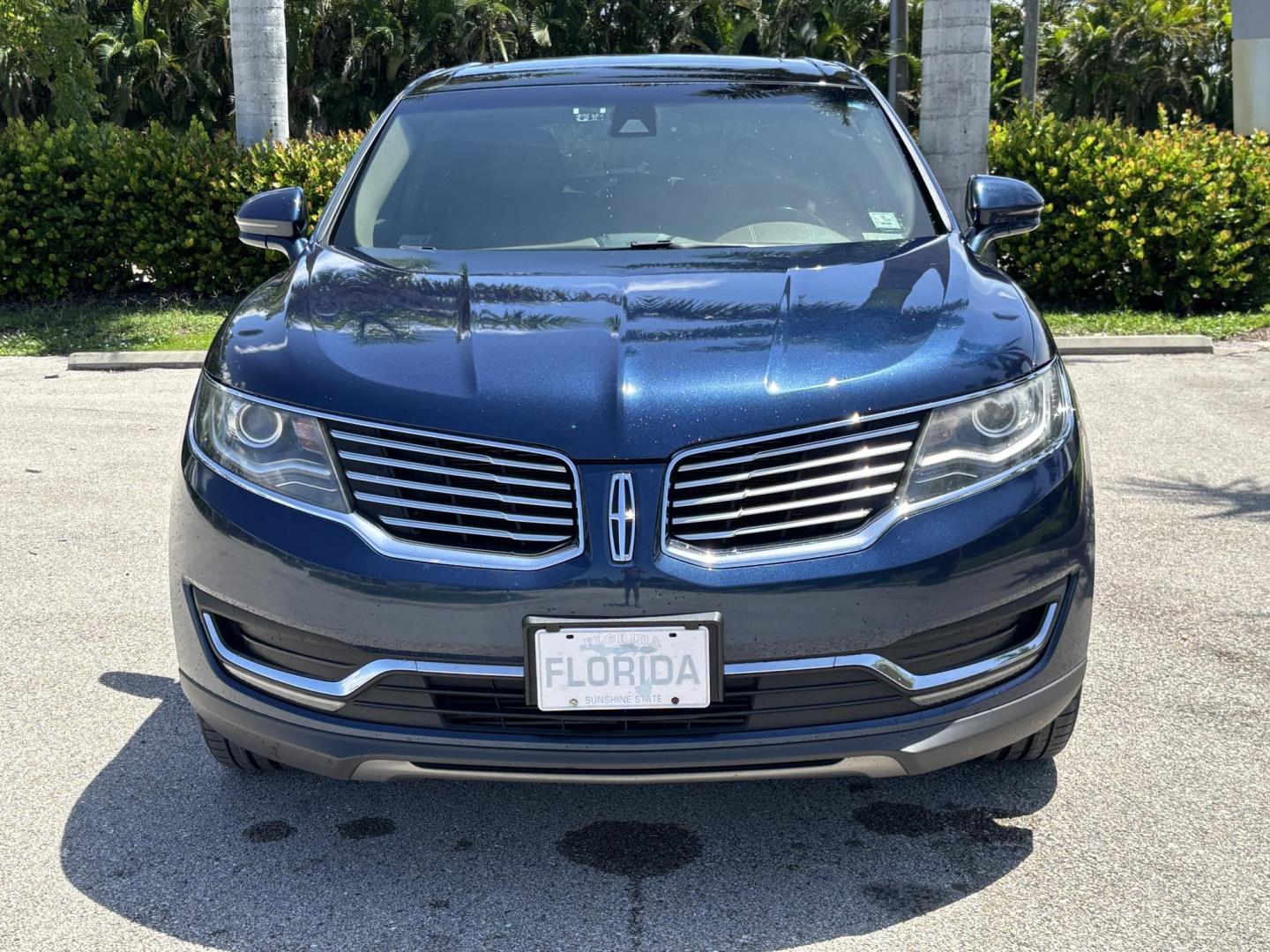 2017 BLUE Lincoln MKX Reserve AWD (2LMPJ8LP2HB) with an 2.7L V6 DOHC 24V engine, 6A transmission, located at 11170 Summerlin Square Dr., Fort Myers Beach, FL, 33931, (239) 999-7777, 26.493546, -81.941628 - Carfax 2 Owner Sale Price $12,900 Carfax Value $14,810 - Photo#1