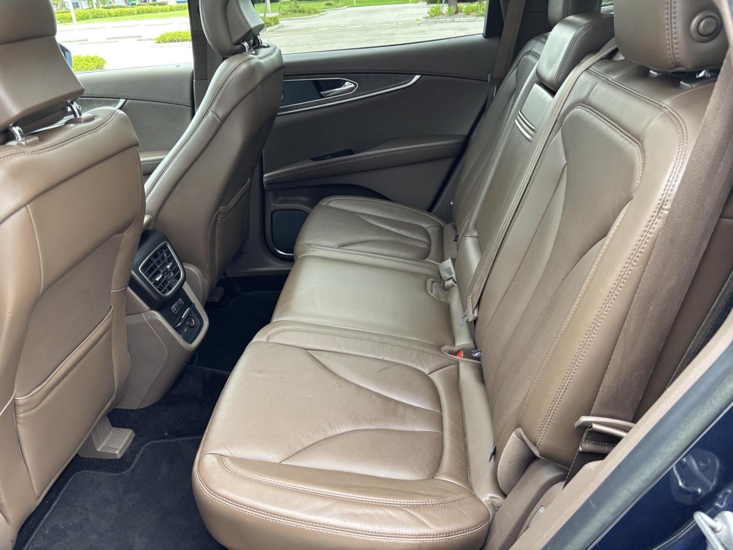 2017 BLUE Lincoln MKX Reserve AWD (2LMPJ8LP2HB) with an 2.7L V6 DOHC 24V engine, 6A transmission, located at 11170 Summerlin Square Dr., Fort Myers Beach, FL, 33931, (239) 999-7777, 26.493546, -81.941628 - Carfax 2 Owner Sale Price $12,900 Carfax Value $14,810 - Photo#16