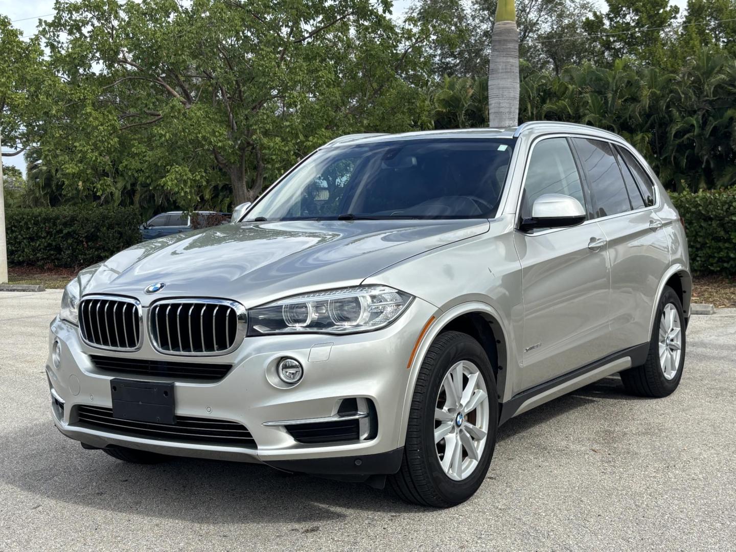 2015 SILVER /BROWN BMW X5 xDrive35i (5UXKR0C56F0) with an 3.0L L6 DOHC 24V engine, 8-Speed Automatic transmission, located at 11170 Summerlin Square Dr., Fort Myers Beach, FL, 33931, (239) 999-7777, 26.493546, -81.941628 - 3rd Row - Photo#1
