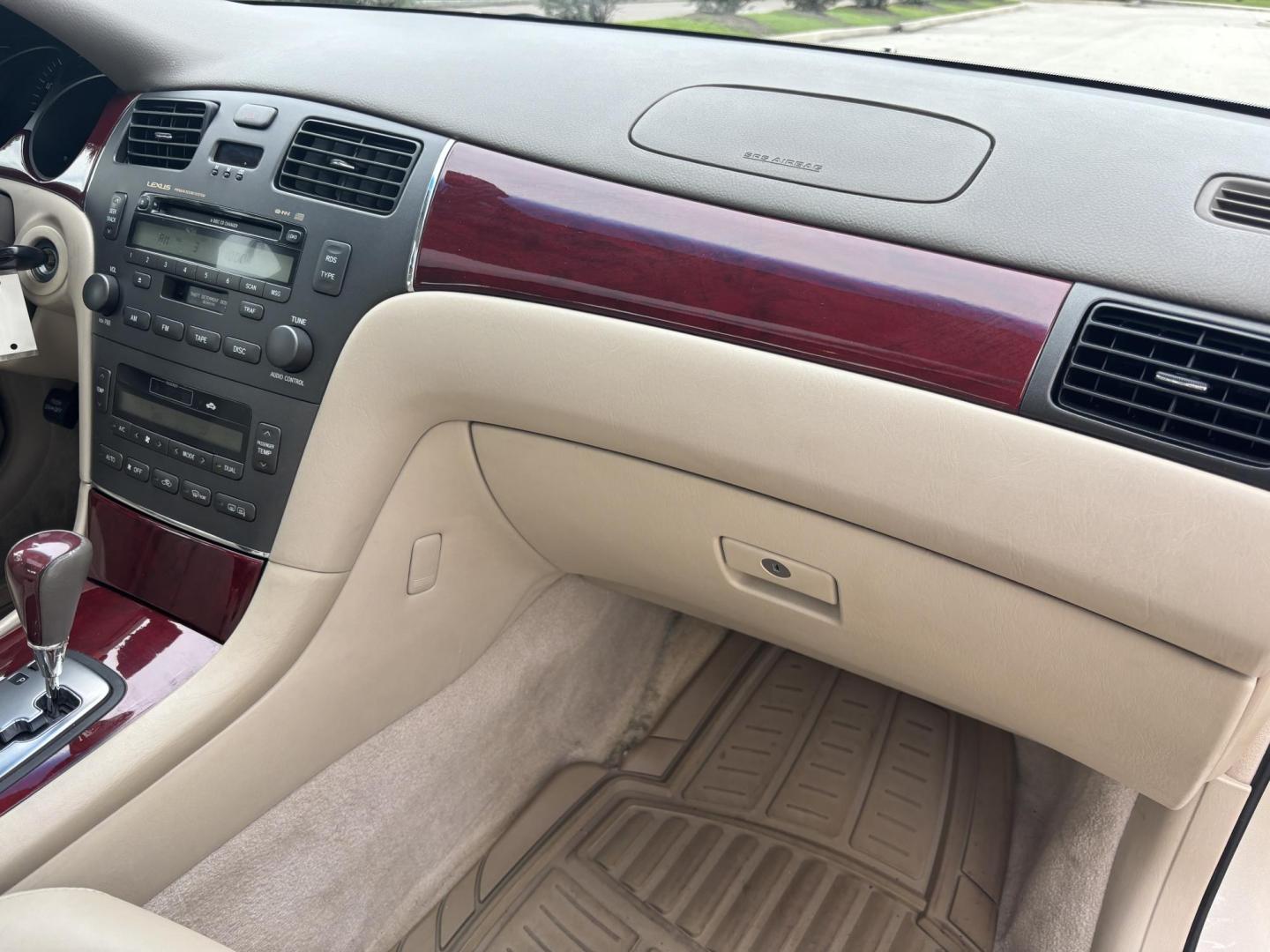 2004 GOLD /TAN Lexus ES 330 Sedan (JTHBA30G440) with an 3.3L V6 DOHC 24V engine, 5-Speed Automatic Overdrive transmission, located at 11170 Summerlin Square Dr., Fort Myers Beach, FL, 33931, (239) 999-7777, 26.493546, -81.941628 - Branded Title We have financing available and we accept trades! Fill out a credit application on our website or come by today! If you have any questions, give us a call at (239) 999 - 7777 or visit our website at firstautocredit.com. 11170 Summerlin Square Dr, Fort Myers Beach, FL 33931 - Photo#13