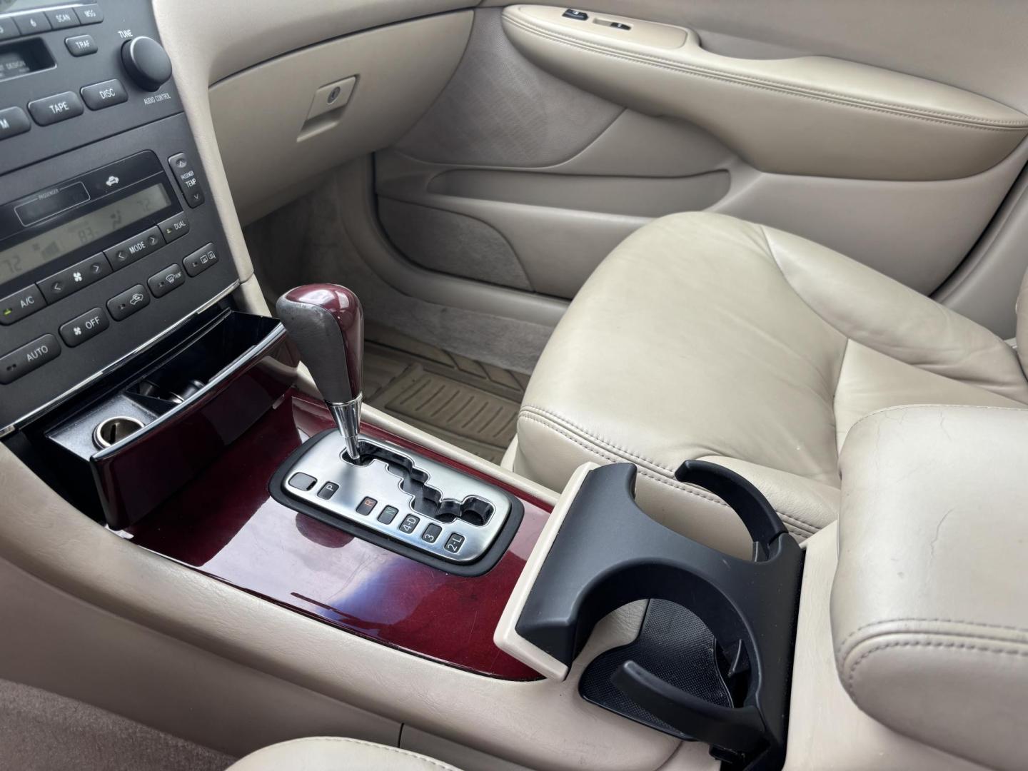 2004 GOLD /TAN Lexus ES 330 Sedan (JTHBA30G440) with an 3.3L V6 DOHC 24V engine, 5-Speed Automatic Overdrive transmission, located at 11170 Summerlin Square Dr., Fort Myers Beach, FL, 33931, (239) 999-7777, 26.493546, -81.941628 - Branded Title We have financing available and we accept trades! Fill out a credit application on our website or come by today! If you have any questions, give us a call at (239) 999 - 7777 or visit our website at firstautocredit.com. 11170 Summerlin Square Dr, Fort Myers Beach, FL 33931 - Photo#11