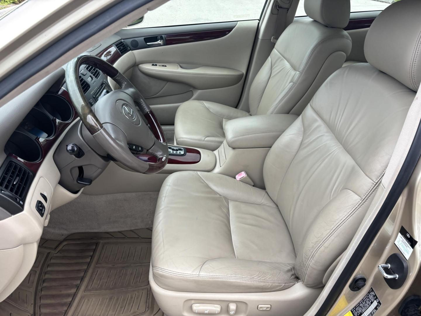 2004 GOLD /TAN Lexus ES 330 Sedan (JTHBA30G440) with an 3.3L V6 DOHC 24V engine, 5-Speed Automatic Overdrive transmission, located at 11170 Summerlin Square Dr., Fort Myers Beach, FL, 33931, (239) 999-7777, 26.493546, -81.941628 - Branded Title We have financing available and we accept trades! Fill out a credit application on our website or come by today! If you have any questions, give us a call at (239) 999 - 7777 or visit our website at firstautocredit.com. 11170 Summerlin Square Dr, Fort Myers Beach, FL 33931 - Photo#7