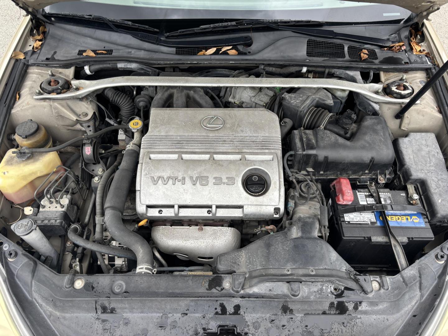 2004 GOLD /TAN Lexus ES 330 Sedan (JTHBA30G440) with an 3.3L V6 DOHC 24V engine, 5-Speed Automatic Overdrive transmission, located at 11170 Summerlin Square Dr., Fort Myers Beach, FL, 33931, (239) 999-7777, 26.493546, -81.941628 - Branded Title We have financing available and we accept trades! Fill out a credit application on our website or come by today! If you have any questions, give us a call at (239) 999 - 7777 or visit our website at firstautocredit.com. 11170 Summerlin Square Dr, Fort Myers Beach, FL 33931 - Photo#33