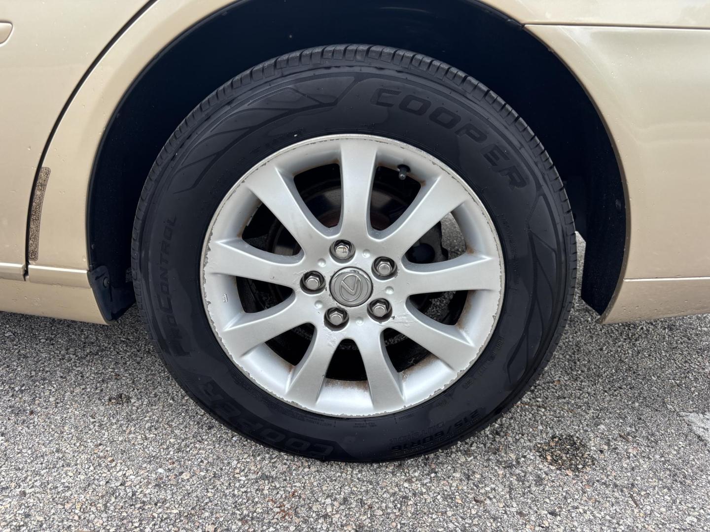 2004 GOLD /TAN Lexus ES 330 Sedan (JTHBA30G440) with an 3.3L V6 DOHC 24V engine, 5-Speed Automatic Overdrive transmission, located at 11170 Summerlin Square Dr., Fort Myers Beach, FL, 33931, (239) 999-7777, 26.493546, -81.941628 - Branded Title We have financing available and we accept trades! Fill out a credit application on our website or come by today! If you have any questions, give us a call at (239) 999 - 7777 or visit our website at firstautocredit.com. 11170 Summerlin Square Dr, Fort Myers Beach, FL 33931 - Photo#37