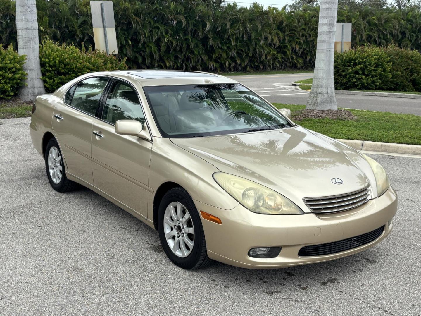 2004 GOLD /TAN Lexus ES 330 Sedan (JTHBA30G440) with an 3.3L V6 DOHC 24V engine, 5-Speed Automatic Overdrive transmission, located at 11170 Summerlin Square Dr., Fort Myers Beach, FL, 33931, (239) 999-7777, 26.493546, -81.941628 - Branded Title We have financing available and we accept trades! Fill out a credit application on our website or come by today! If you have any questions, give us a call at (239) 999 - 7777 or visit our website at firstautocredit.com. 11170 Summerlin Square Dr, Fort Myers Beach, FL 33931 - Photo#2