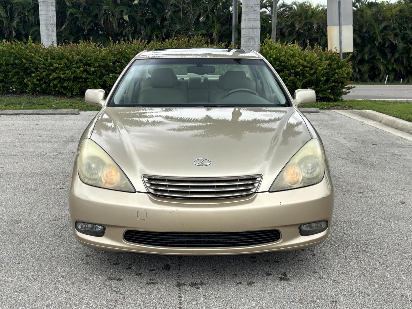 2004 GOLD /TAN Lexus ES 330 Sedan (JTHBA30G440) with an 3.3L V6 DOHC 24V engine, 5-Speed Automatic Overdrive transmission, located at 11170 Summerlin Square Dr., Fort Myers Beach, FL, 33931, (239) 999-7777, 26.493546, -81.941628 - Branded Title We have financing available and we accept trades! Fill out a credit application on our website or come by today! If you have any questions, give us a call at (239) 999 - 7777 or visit our website at firstautocredit.com. 11170 Summerlin Square Dr, Fort Myers Beach, FL 33931 - Photo#1