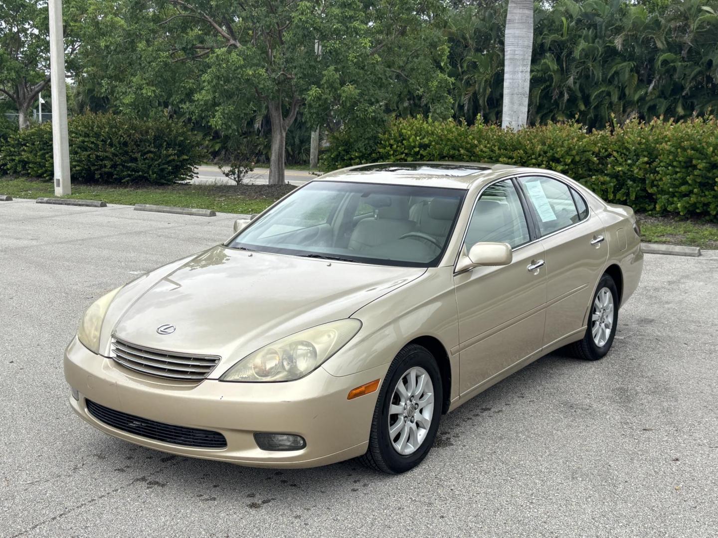 2004 GOLD /TAN Lexus ES 330 Sedan (JTHBA30G440) with an 3.3L V6 DOHC 24V engine, 5-Speed Automatic Overdrive transmission, located at 11170 Summerlin Square Dr., Fort Myers Beach, FL, 33931, (239) 999-7777, 26.493546, -81.941628 - Branded Title We have financing available and we accept trades! Fill out a credit application on our website or come by today! If you have any questions, give us a call at (239) 999 - 7777 or visit our website at firstautocredit.com. 11170 Summerlin Square Dr, Fort Myers Beach, FL 33931 - Photo#0
