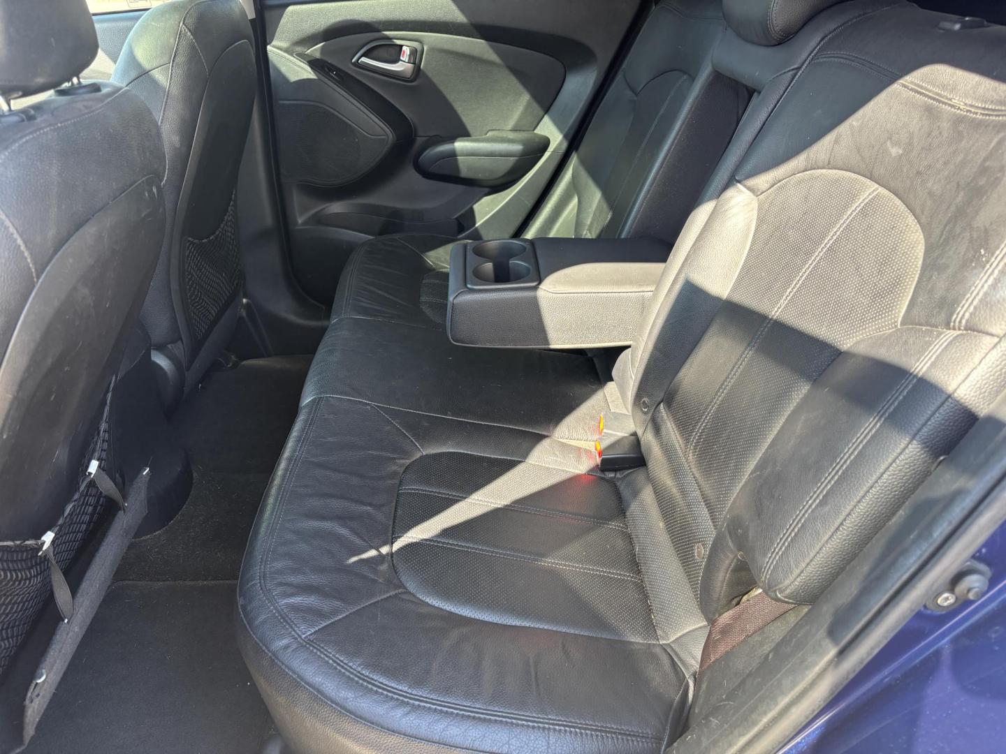 2011 BLUE /BLACK LEATHER Hyundai Tucson Limited 2WD (KM8JU3AC2BU) with an 2.4L L4 DOHC 16V engine, 6-Speed Automatic transmission, located at 11170 Summerlin Square Dr., Fort Myers Beach, FL, 33931, (239) 999-7777, 26.493546, -81.941628 - Photo#17