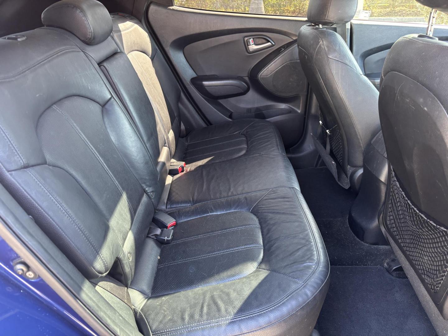 2011 BLUE /BLACK LEATHER Hyundai Tucson Limited 2WD (KM8JU3AC2BU) with an 2.4L L4 DOHC 16V engine, 6-Speed Automatic transmission, located at 11170 Summerlin Square Dr., Fort Myers Beach, FL, 33931, (239) 999-7777, 26.493546, -81.941628 - Photo#16