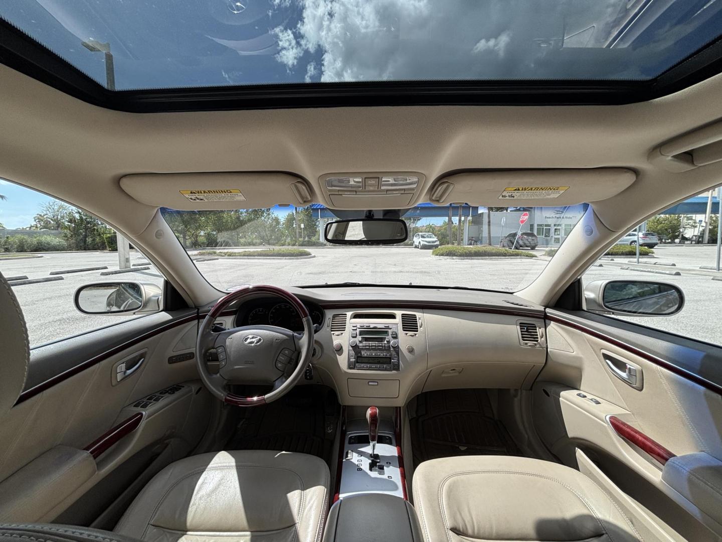 2006 BEIGE /TAN LEATHER Hyundai Azera Limited (KMHFC46F56A) with an 3.8L V6 DOHC 24V engine, 5-Speed Automatic Overdrive transmission, located at 11170 Summerlin Square Dr., Fort Myers Beach, FL, 33931, (239) 999-7777, 26.493546, -81.941628 - Photo#9