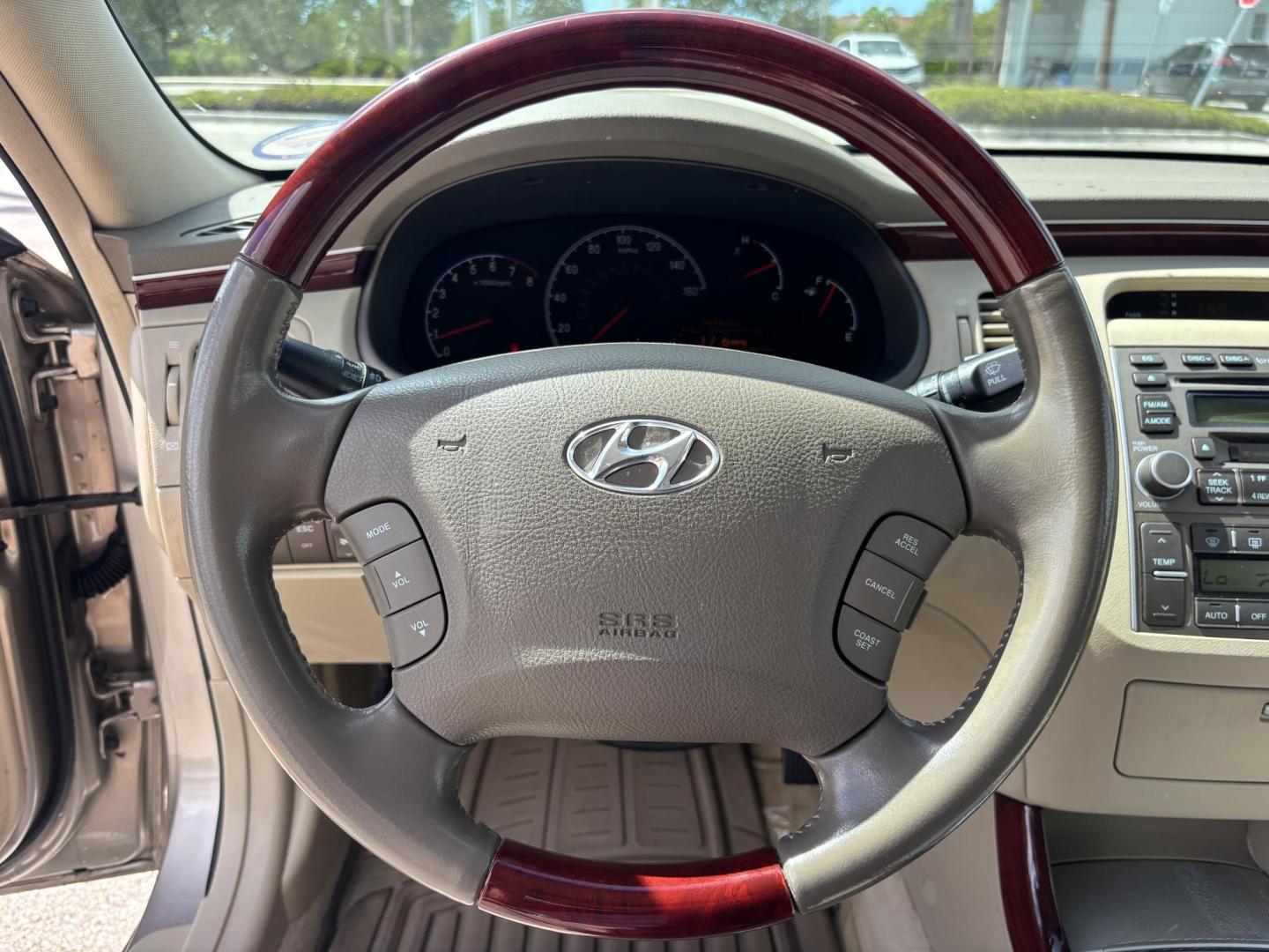 2006 BEIGE /TAN LEATHER Hyundai Azera Limited (KMHFC46F56A) with an 3.8L V6 DOHC 24V engine, 5-Speed Automatic Overdrive transmission, located at 11170 Summerlin Square Dr., Fort Myers Beach, FL, 33931, (239) 999-7777, 26.493546, -81.941628 - Photo#26