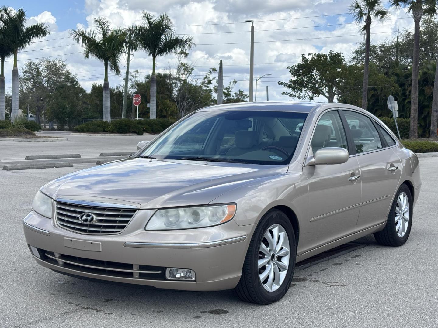 2006 BEIGE /TAN LEATHER Hyundai Azera Limited (KMHFC46F56A) with an 3.8L V6 DOHC 24V engine, 5-Speed Automatic Overdrive transmission, located at 11170 Summerlin Square Dr., Fort Myers Beach, FL, 33931, (239) 999-7777, 26.493546, -81.941628 - Photo#1