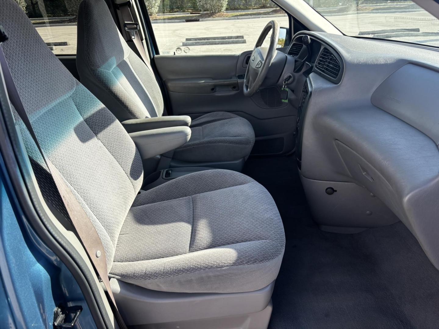 2002 BLUE /GREY CLOTH Ford Windstar LX (2FMZA51422B) with an 3.8L V6 OHV 12V engine, 4-Speed Automatic Overdrive transmission, located at 11170 Summerlin Square Dr., Fort Myers Beach, FL, 33931, (239) 999-7777, 26.493546, -81.941628 - Photo#16